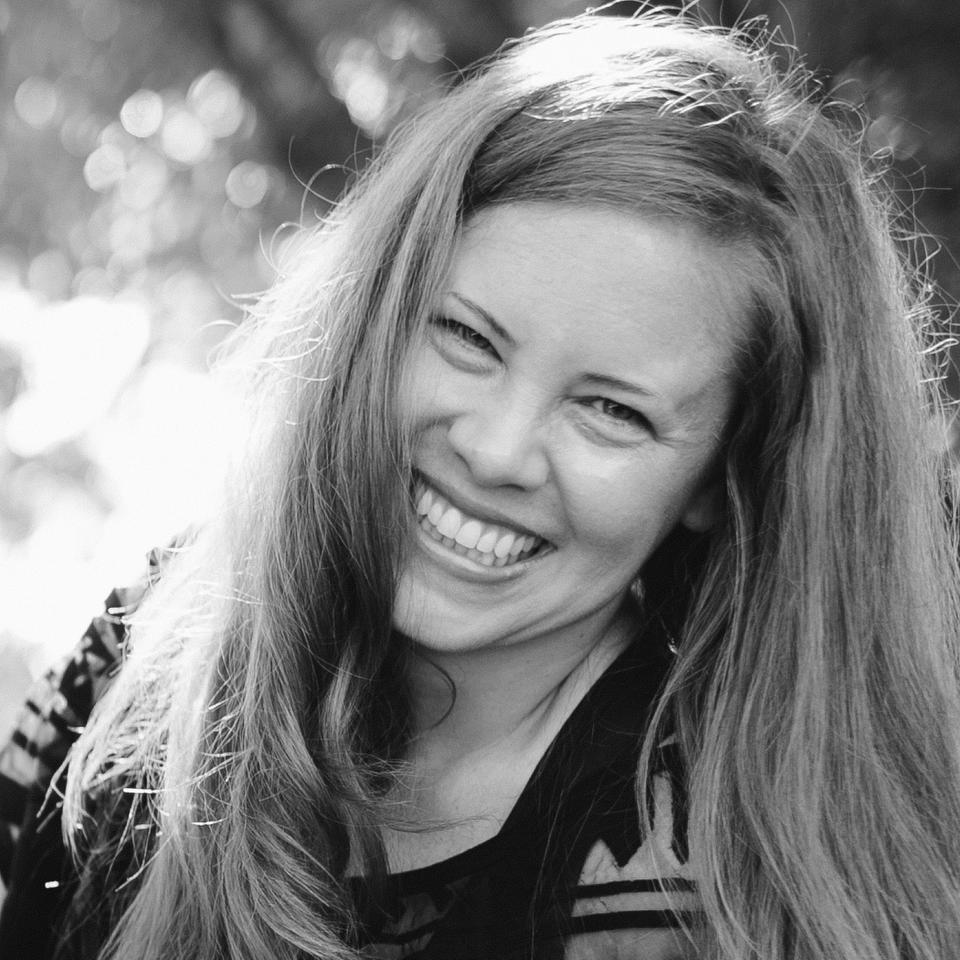black and white photo of luna crow smiling: white skinned woman with long hair outside black and white photo of luna crow smiling: white skinned woman with long hair outside