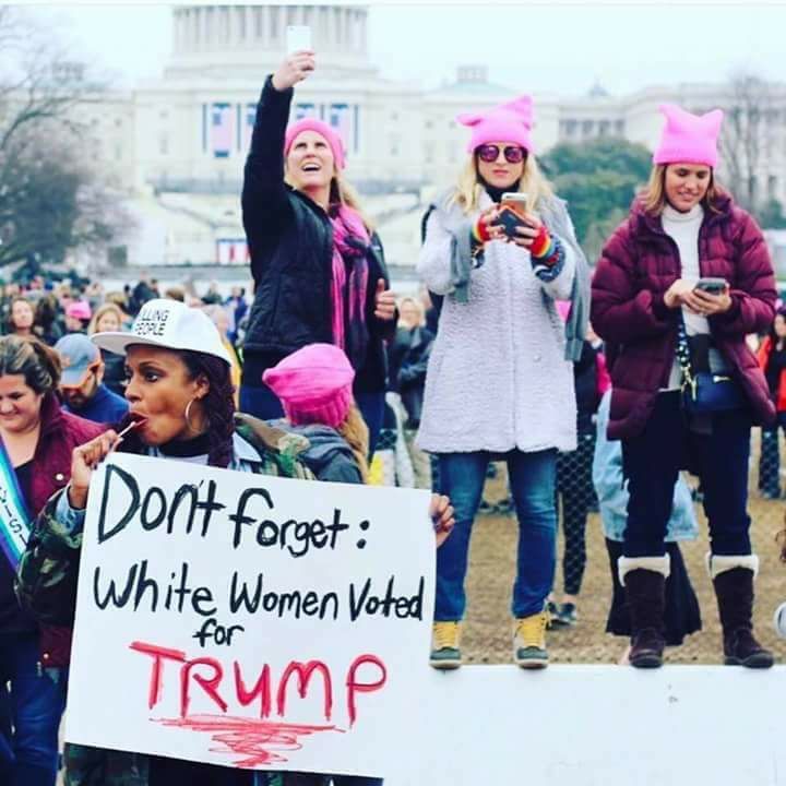 Click for article about the woman holding this sign: Angela Peoples Women at the DC March