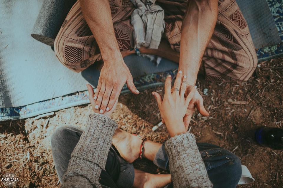 two people touching hands two people touching hands