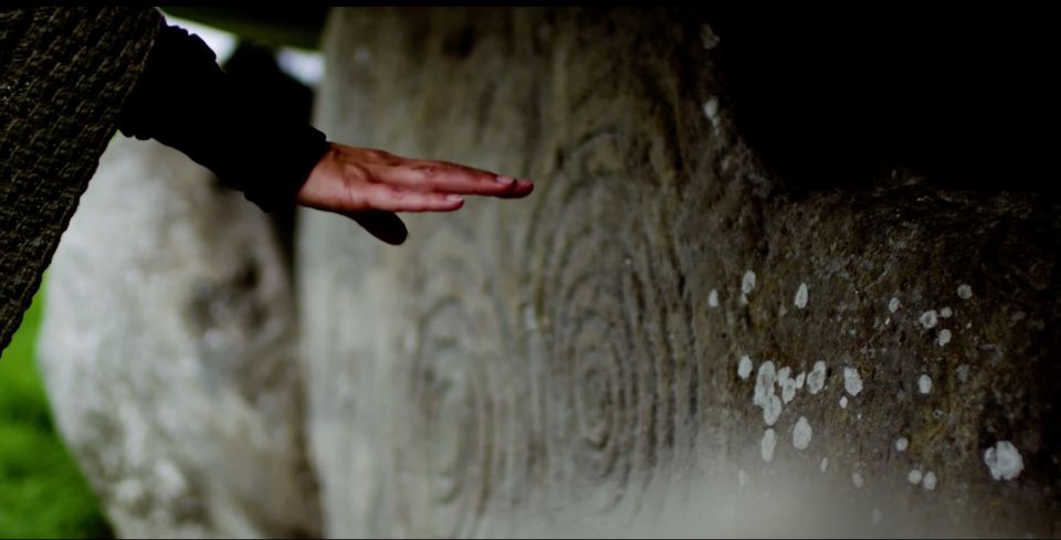 Peia's hand touching ancient stone Peia's hand touching ancient stone